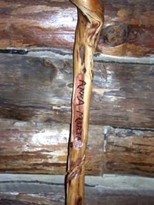 Hand Carved Cane on cedar