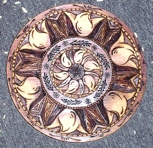 Hand Carved Trivets and Medallions